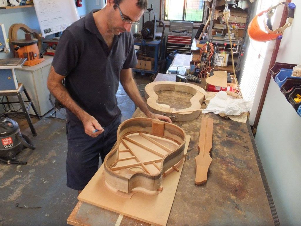 Remi Garcia building a guitar